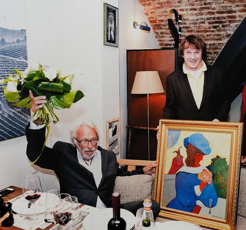 Pierre Richard with a painting by Igor Tcholaria